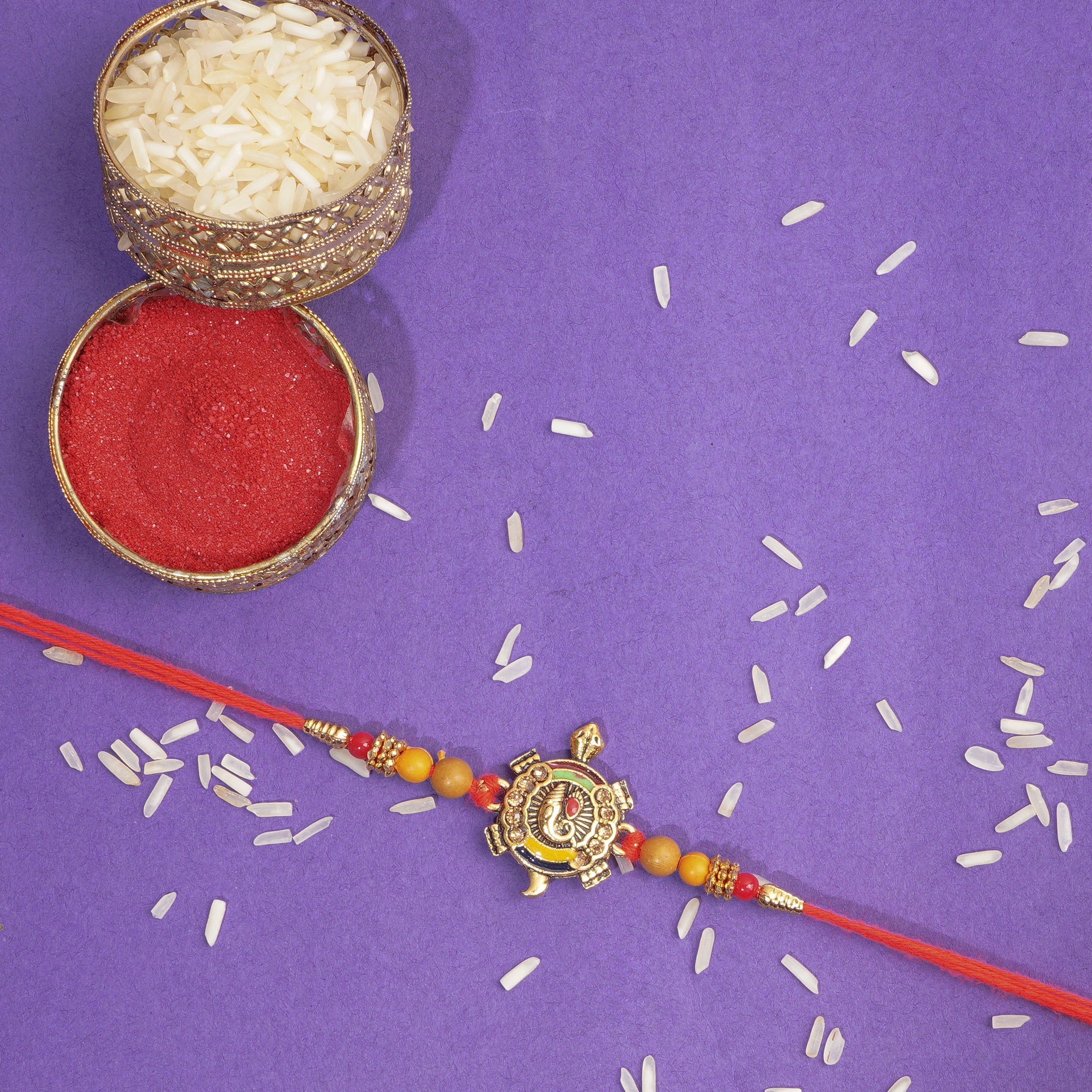 Design Arche auspicious Rakhi for brother for peace and prosperity